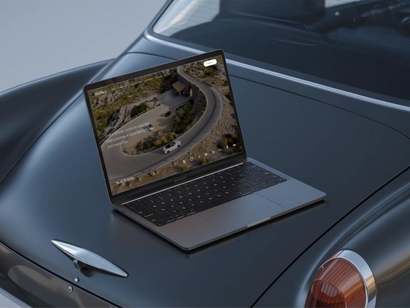 Autohaus Standard website on a laptop resting on a car