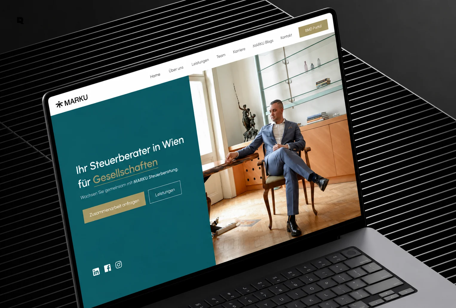 MARKU Steuerberatung home page on a laptop
